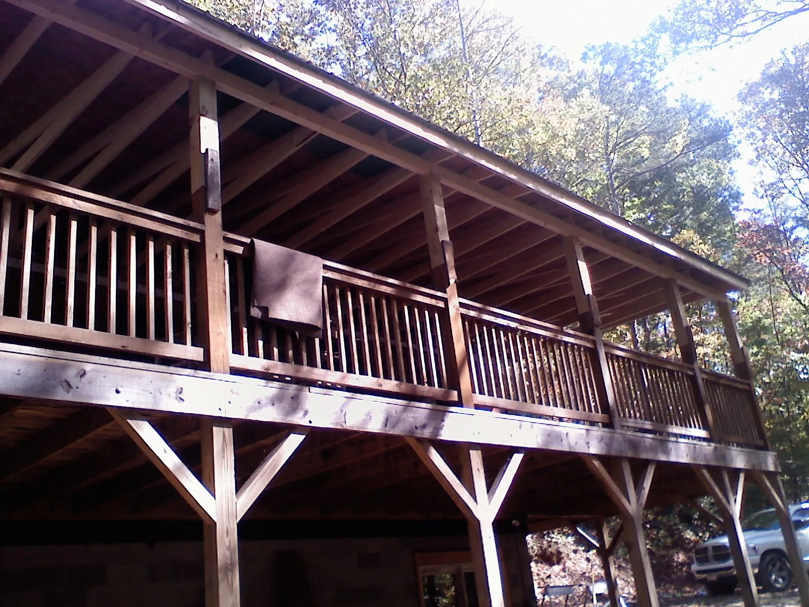 Timber framing under a new elevated porch and deck — Roof Leak Repair in State Road by Roofing Brothers